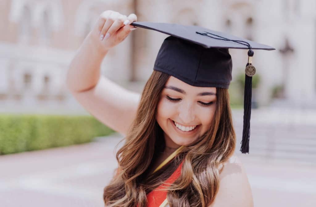 Ally Sanchez on the USC campus wearing commencement cap