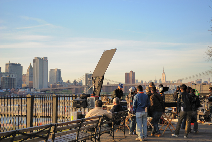 Film production shoot in Brooklyn, New York overlooking the New York City skyline and Brooklyn Bridge.