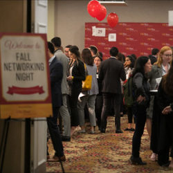 Students at a Price networking event.
