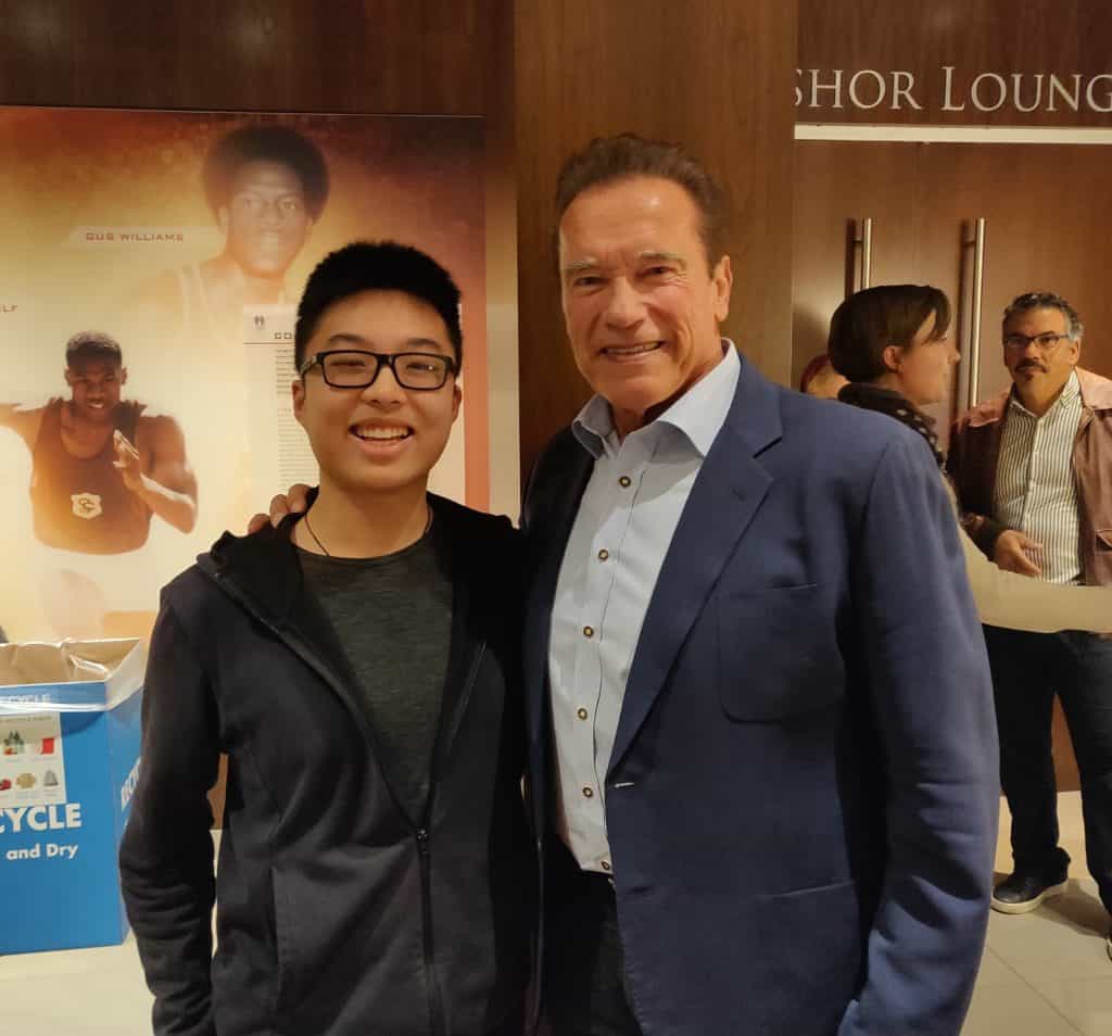 Victor Qiu and former Gov. Arnold Schwarzenegger