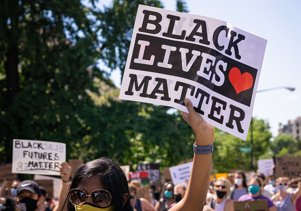 Washington D.C./USA- June 7th 2020: A protester holding a Black Lives Matter sign in Washington D.C.
