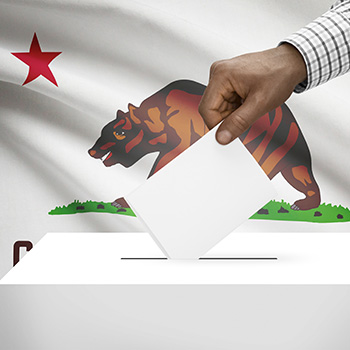 Voting concept - Ballot box with US state flag on background - California