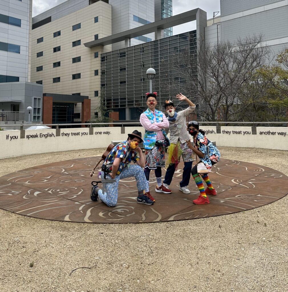 Phong Doozy with other volunteer medical clowns outside the hospital. 