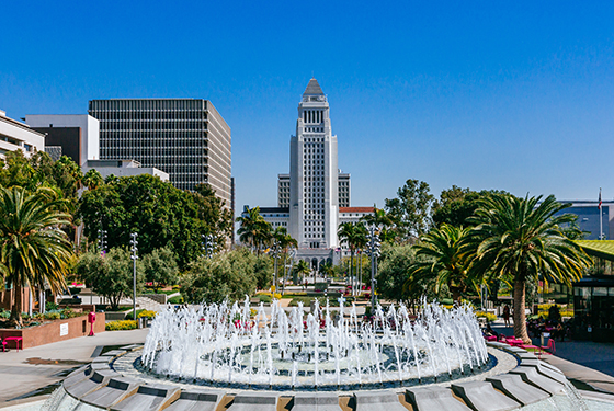 Fountain in Grand Park, and Los Angeles City Hall, in Downtown Los Angeles, California, USA