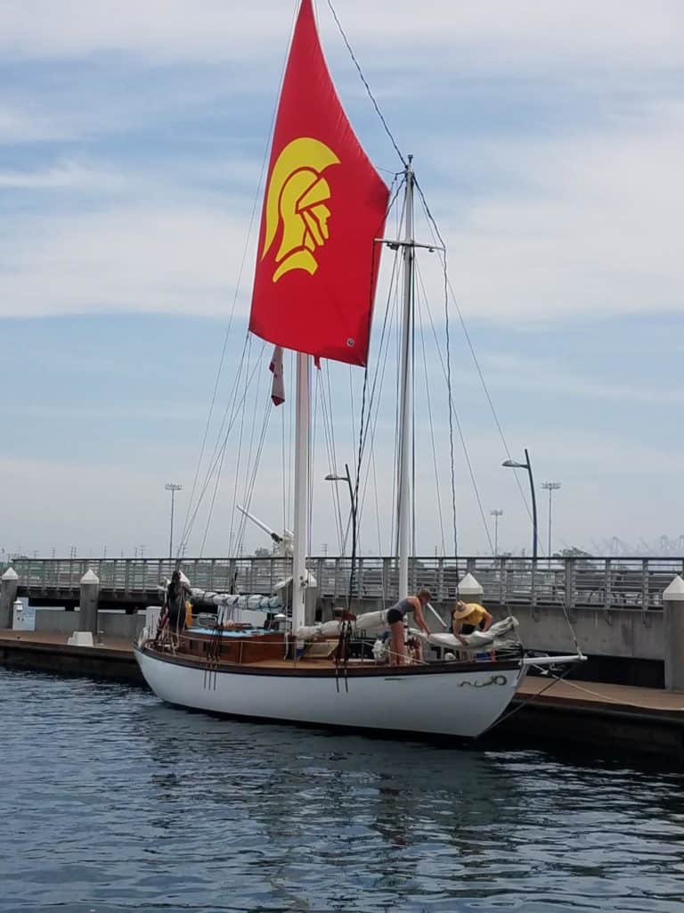 Boat with red sail