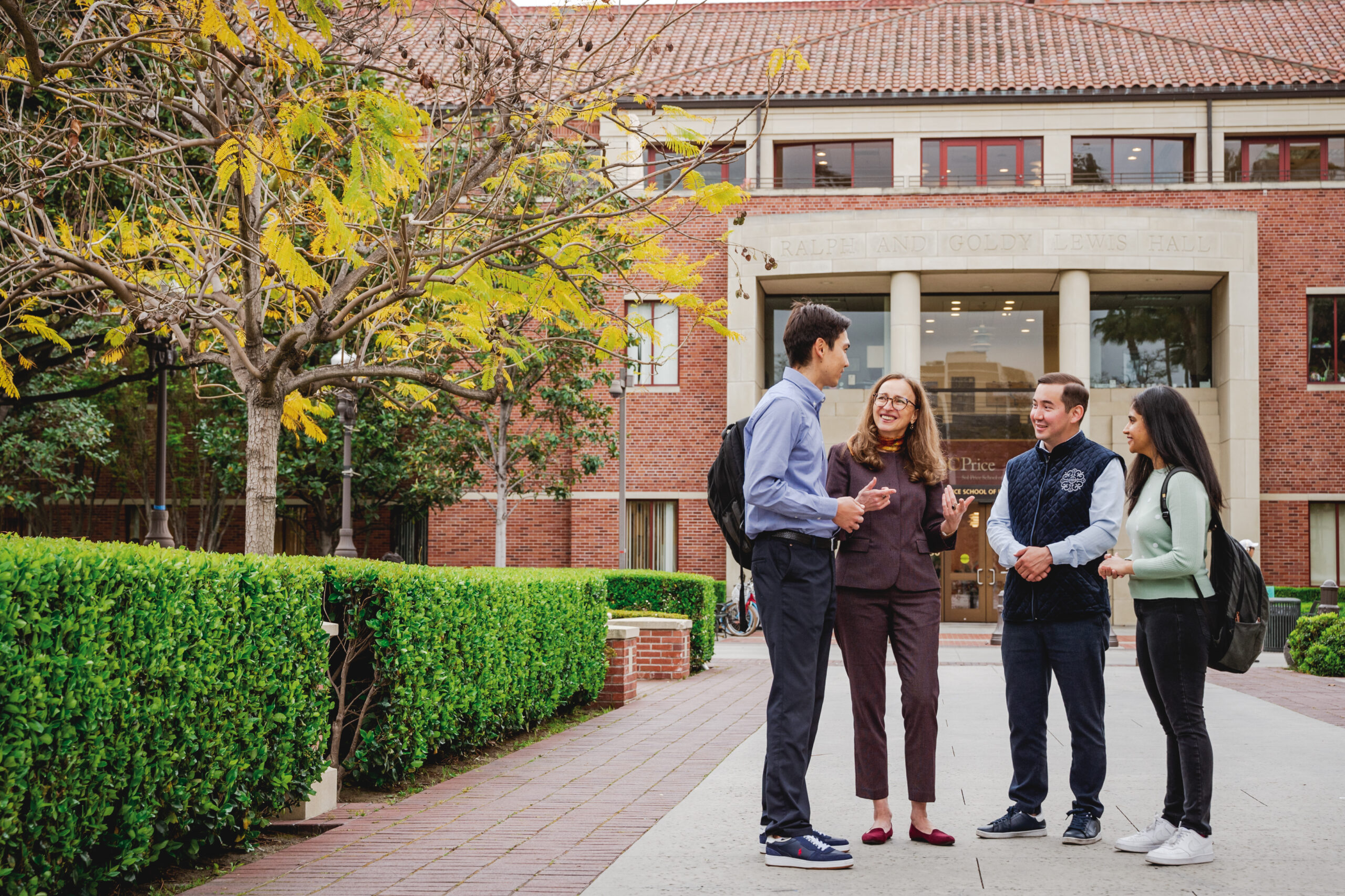 Master of Public Policy students standing outside of the RGL building on the USC campus.