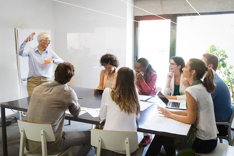 Group of students at work in modern office