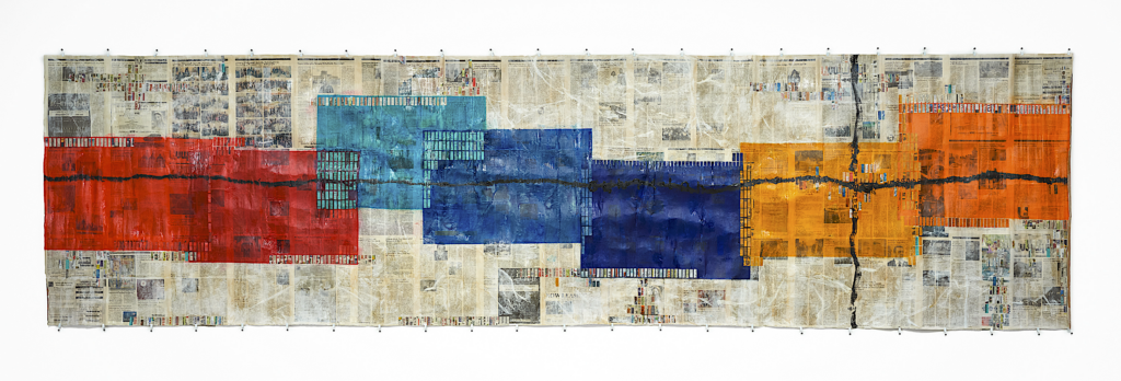 A photo of Kim's artwork, which uses newspaper clippings to create a horizontal timeline